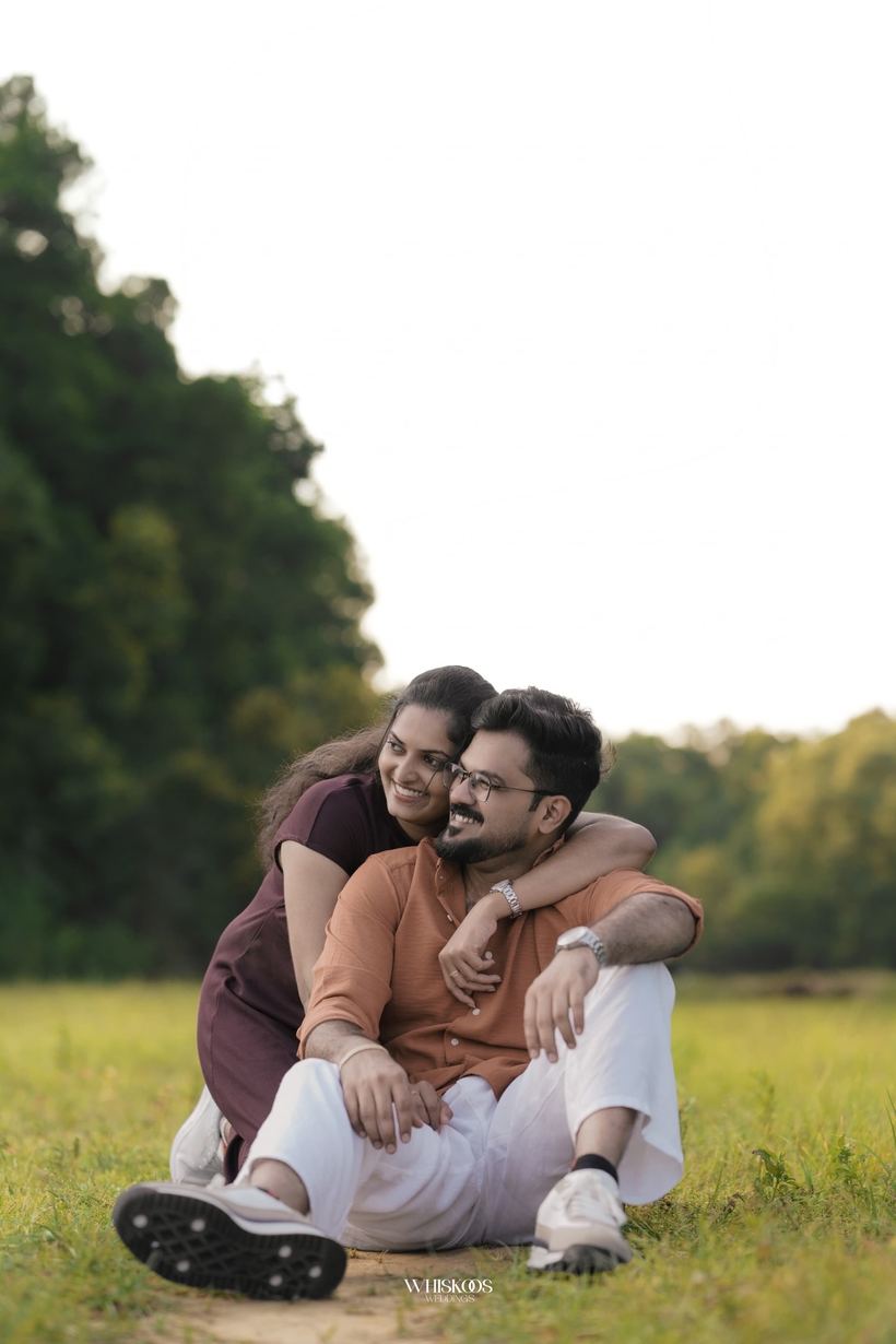 Meghna and Shimil sitting together on the grass